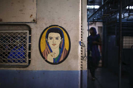 Bombay local: Icon outside women's compartments on Mumbai suburban trains.