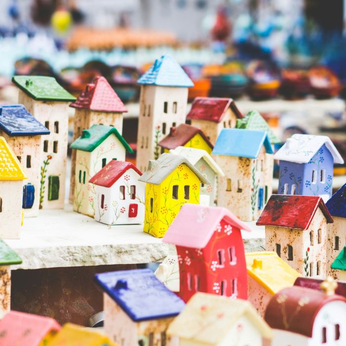 An arrangement of miniature colourful ceramic houses
