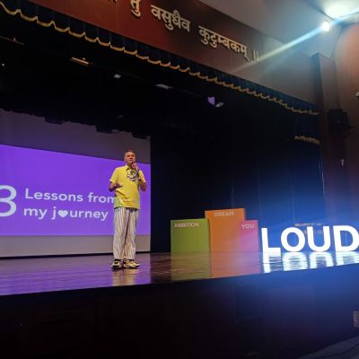 Parmesh Shahani speaking at LOUD 2024 at SIBM Pune.