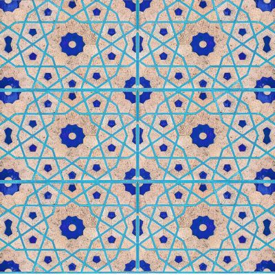 A blue and pink ceramic tile pattern on an off-white background.