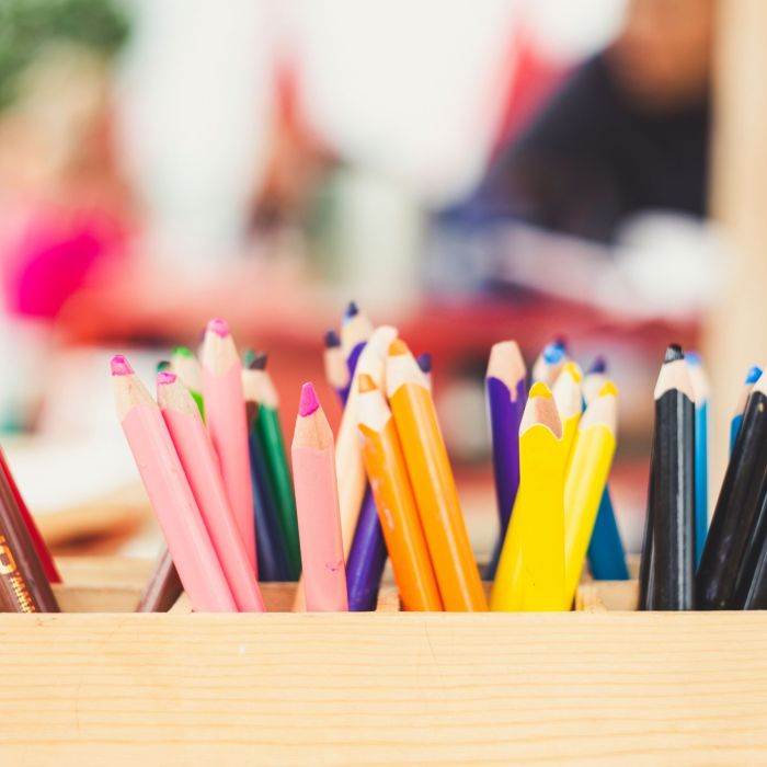 Assorted colour pencils in a pencil stand.